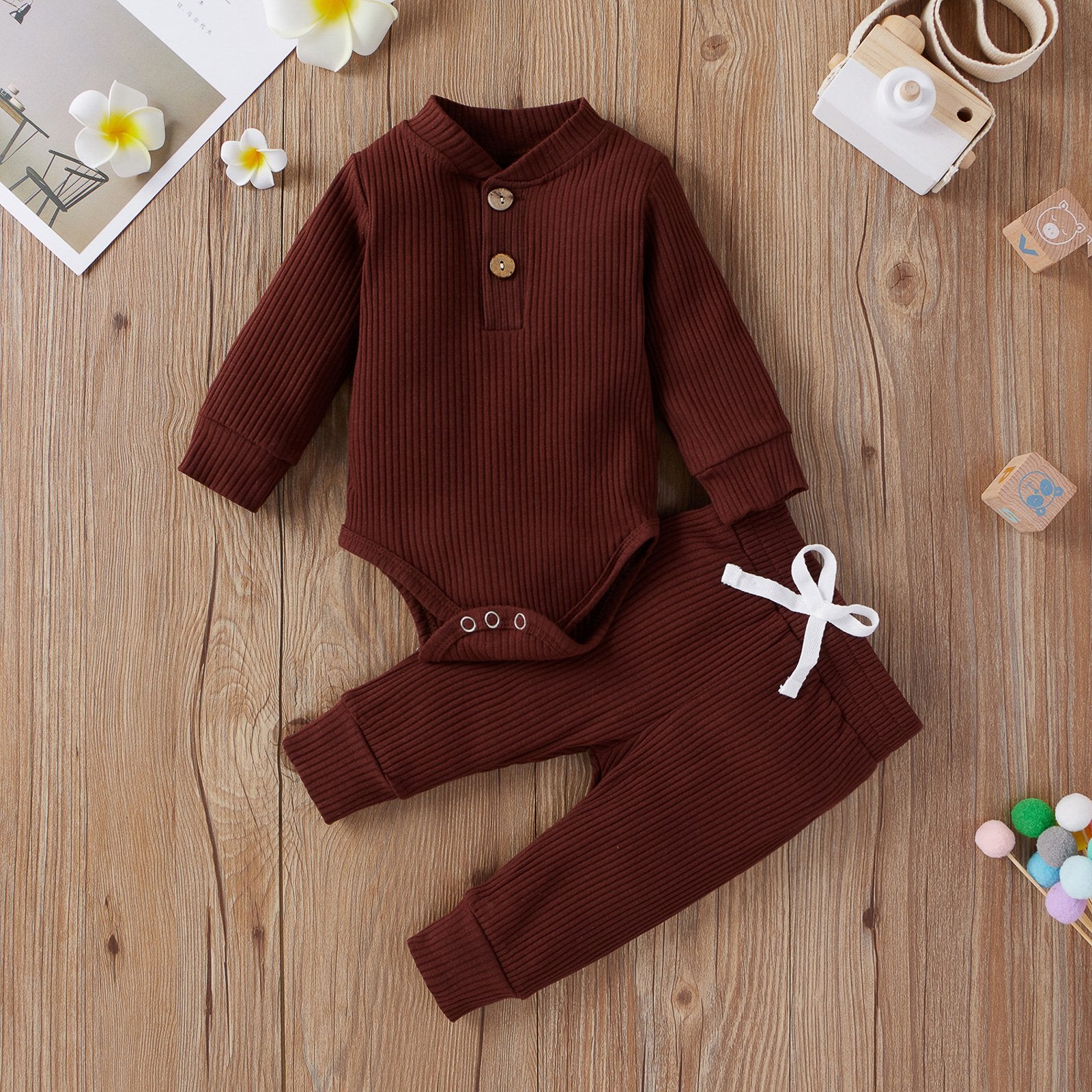 Solid color pit strip long-sleeved baby jumpsuit and trousers suit wholesale